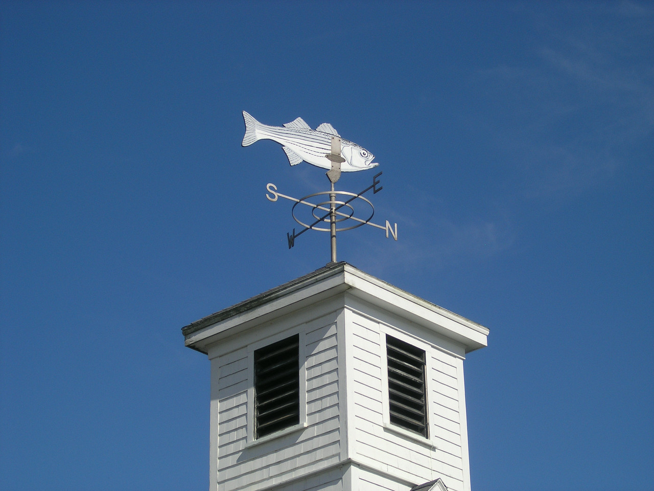 striped bass weathervane on top of Cuttyhunk church