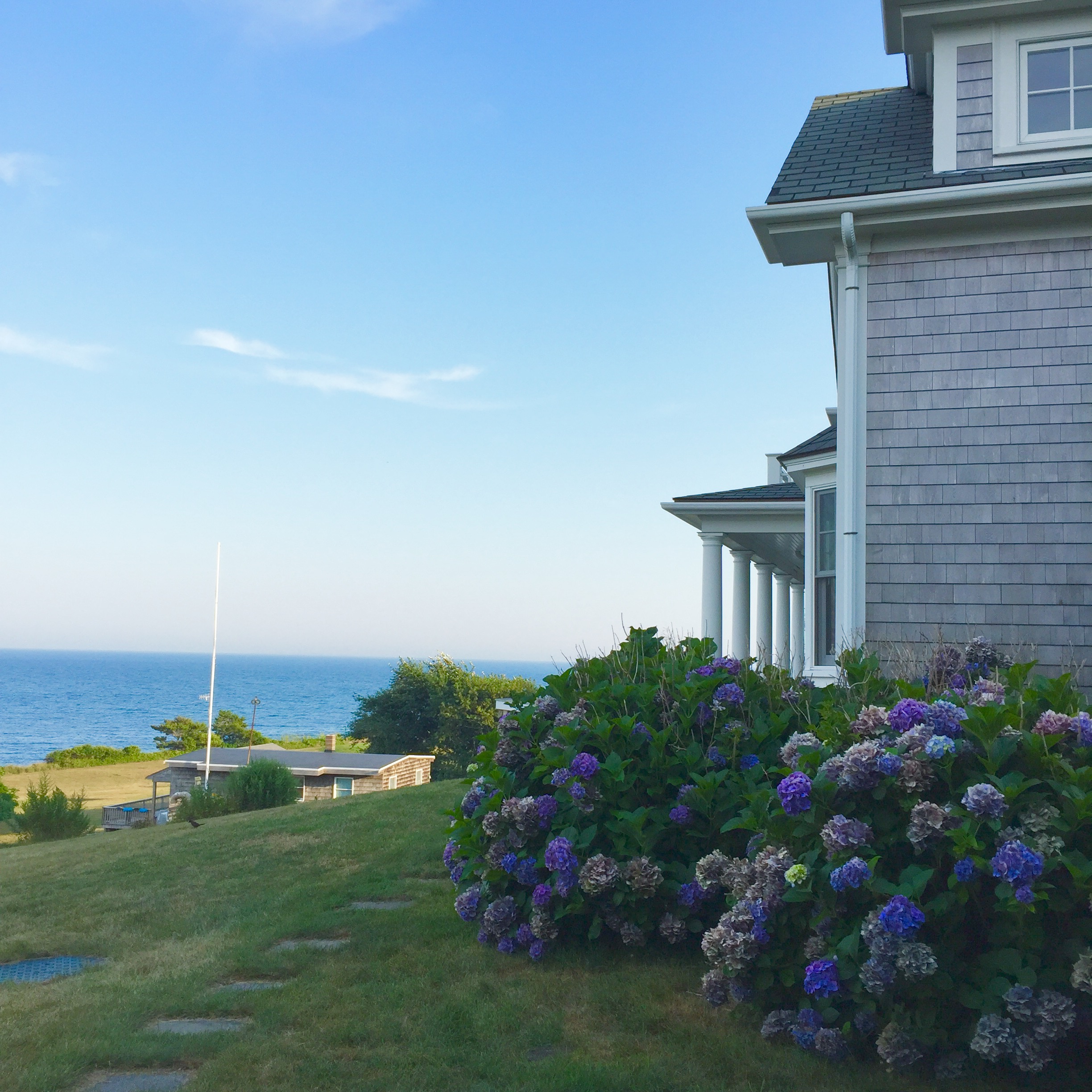A typical house on Cuttyhunk with sea view and hydrangea